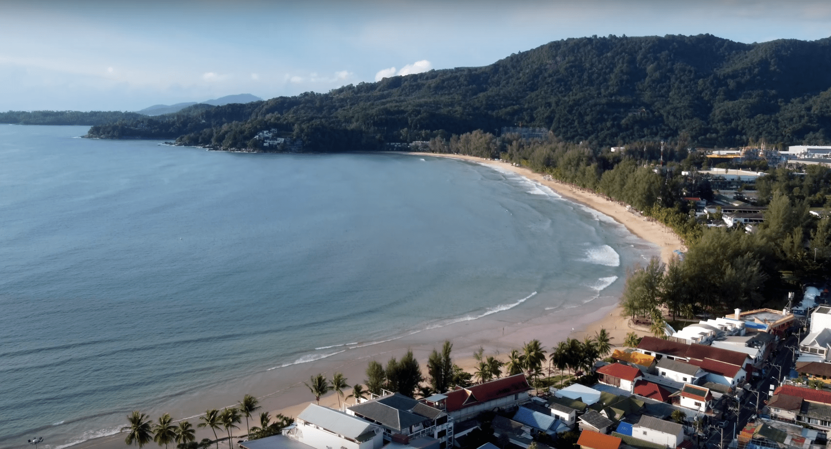 Kamala Beach bay and surrounding green hills