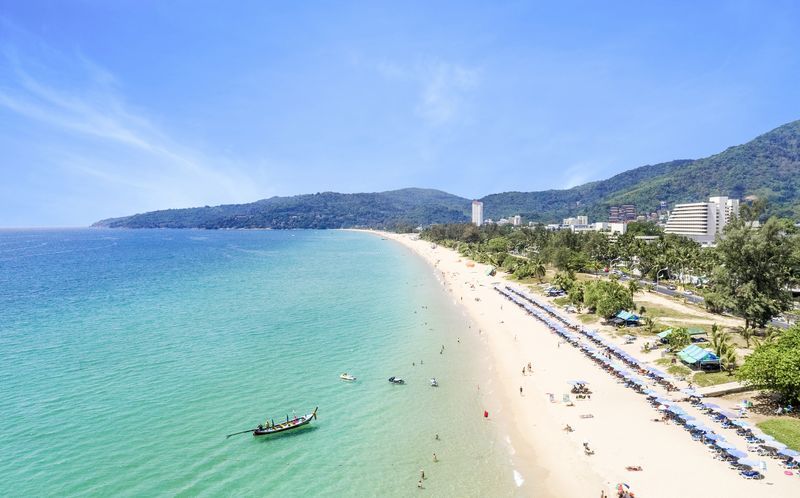 Wide Karon Beach shoreline and turquoise sea